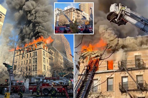 Flames erupt from windows, roof as massive blaze engulfs NYC apartment building
