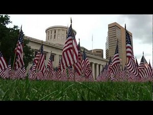 Volunteers Plant Flags On Statehouse Lawn As 9/11 Memorial