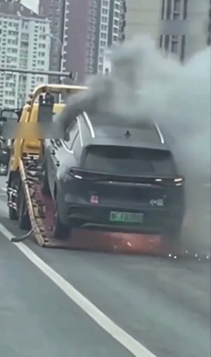 BYD EV car caught on fire while transporting on trailer