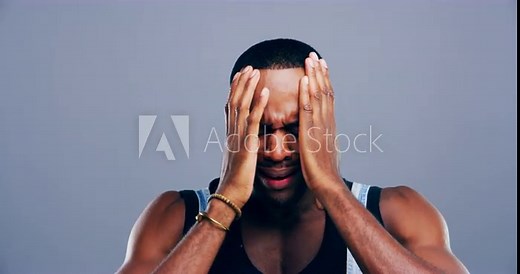 Sad, depression and black man crying in a studio with upset, worry and negative face expression. Emotions, grief and young African male person with tears for heartbreak isolated by gray background.