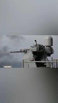 U.S. Navy Mk 38 machine gun system during live-fire exercises in the Pacific Ocean.