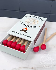 This creation is the perfect late night snack for a night outdoor under the stars. Each matchstick is my take on a s'more ready to eat! It's composed of two crunchy vanilla sable cups, a milk chocolate caramel ganache, a milk chocolate spread. All wrapped in a caramelized vanilla marshmallow, and a thin layer of colored white chocolate. The matchsticks are made with a caramelized white chocolate and smoked with oak wood! the box it self is crafted out of 100% chocolate. As usual the entire creat