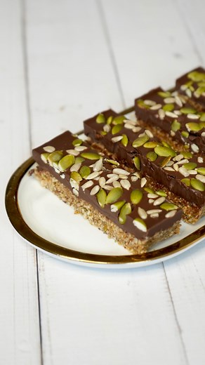 Meghna’s Food Magic on Instagram: "DATES SEEDS BAR - No Added Sugar No Butter No Maida - Very Healthy - #GetFitWithMeghna . When you get sweet cravings, keep this healthy bar in the fridge. Pumpkin seeds with its anti-inflammatory abilities can help maintain good function in the liver, bladder, bowel, and joints. Pumpkin seeds are high in magnesium, which most people don’t get enough of in their diet, helps regulate blood sugar levels, lowering your diabetes risk. Also Sunflower seeds are high i