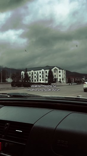 Scenic View from Inside a Car to a Two-Story Building