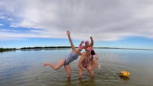 Women swimming 90K along Last Mountain Lake