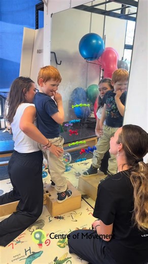 Children with Angelman syndrome commonly present with delayed motor milestones, gait variability, and challenges with coordination due to differences involving the UBE3A gene and downstream neuro-cerebellar pathways. These factors can influence how their bodies organise movement and respond to new motor tasks. By working collaboratively and intentionally scaffolding Van’s sensory motor system, we help his brain form new pathways while keeping the experience playful and safe. Cat offered bubbles 