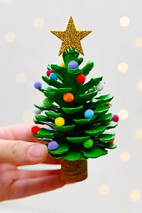 3.6M views · 21K reactions | ✨ These pinecone Christmas trees might be the cutest holiday craft ever! Kids will LOVE turning a simple pinecone into a cheerful little tree decorated with bright colors and festive charm.  https://onelittleproject.com/pine-cone-christmas-tree/ | One Little Project | Facebook