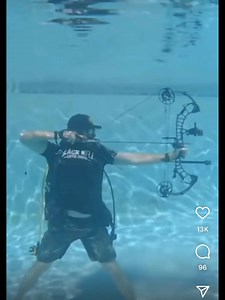 Shooting a compound bow underwater