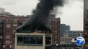 1 dead, 4 injured in River North parking garage fire