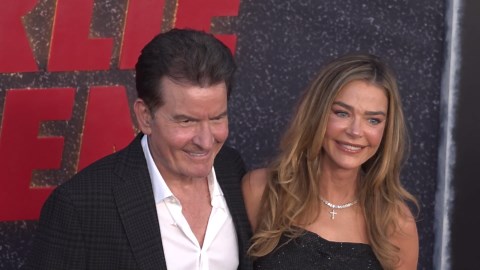Denise Richards and ex-husband Charlie Sheen hug in first joint red carpet appearance in 19 years