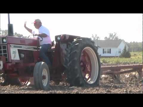 International 784 Bright lighting plowing.