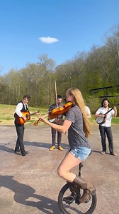 Fiddling Around 🎻😆Water Tower #watertowerwednesday #oldtime #fiddle #banjo #unicycle #stunt #bluegrass #cirque #circus | Hillary Klug
