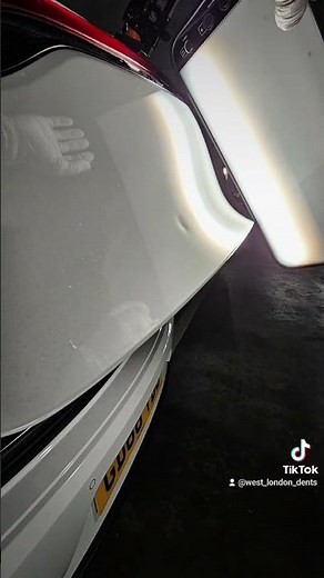 Porsche Macan boot lid paintless dent repair.