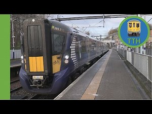 Class 385 departs Springburn