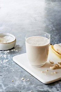 This BANANA COCONUT CREAM PIE SMOOTHIE from The Blender Girl Smoothies app and book is dessert in a glass. So easy and really delicious. If you have a conventional blender soak your cashews and coconut in boiled water for 10 minutes and drain to get the smoothest texture. GET THE FULL PRINTED RECIPE: https://www.theblendergirl.com/recipe/banana-coconut-smoothie/ | The Blender Girl