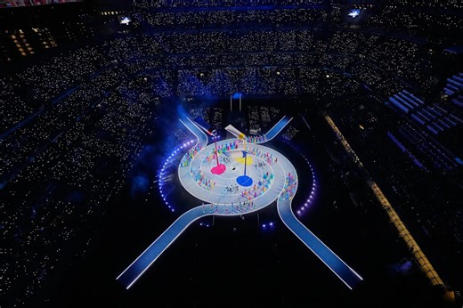 The Latest: Two cauldrons are lit for the first time at a Winter Olympics