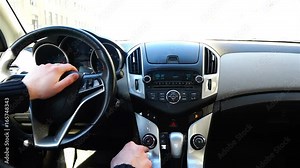 control panel and signal buttons from the driver's side of the car.