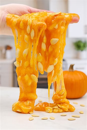 🎃 Stretchy, gooey, and full of fall fun — this Pumpkin Slime is like playing with real pumpkin guts… only better! 🧡🙌 Made with just a few simple ingredients and packed with real pumpkin seeds, this slime is the ultimate sensory activity for fall. It’s sticky, squishy, and perfect for kids who love messy play! Great for Halloween parties, autumn crafts, or a fun afternoon at home. https://onelittleproject.com/pumpkin-slime/ | One Little Project