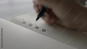 Marking Items Off Checklist in Office Setting