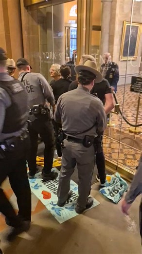 NOW: Arrests outside New York State Senate chamber as protestors call for action on immigration bills, including New York For All.