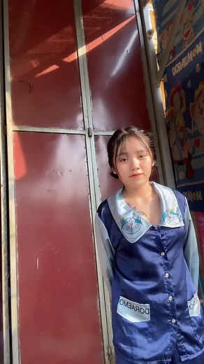 Doraemon-Themed Uniform Showcase with Cartoon Characters