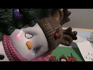 Painting Eyes on ceramic Snowman