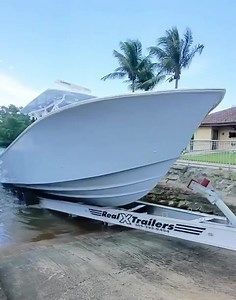 Stunning 35 SeaHunter heading back to our factory after a successful initial sea trial • • • • • • #fish #boat #boats #boatlife #fishing #ocean #marina #trailer #centerconsole #outboard #miami | SeaHunter Boats