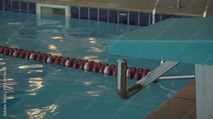 a training pool for swimmers. Modern pool for swimming and active sports. Blue water in the pool at dawn