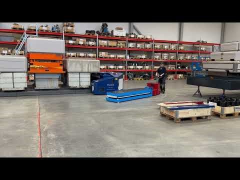 Motorized scissor lift table.