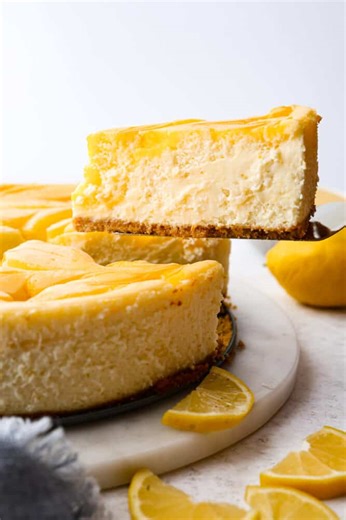 24K views · 140 reactions | Recipe here: https://therecipecritic.com/lemon-cheesecake/ The lemon curd adds the perfect tangy kick to the creamy cheesecake filling, making every bite a smooth, heavenly experience. | The Recipe Critic | Facebook