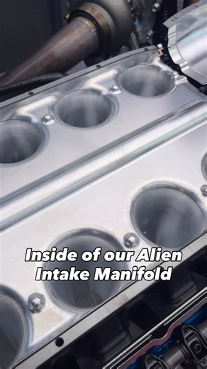 Tom Nelson on Instagram: "Here is a cool inside view of our Alien Series intake manifolds. It provides a nice, straight shot at the back of the valve with our specific taper angles and smooth runner transitions, along with a massive reinforced lid for handling tons of boost. #AlienIntake #NelsonRacingEngines #AreyoureadytobepoweredbyNRE"
