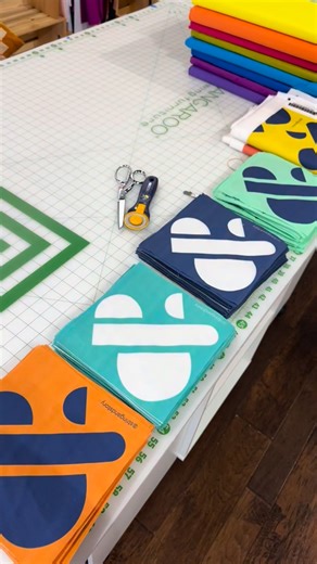 The “story” part of our String & Story name is a reference to our humanity— yes, we are crafters, but we are whole people and members of communities, too. Our ampersand logo is made of different sizes and colors of patchwork blocks as a reminder that our strength and beauty is in our diversity. These qualities are on special display at QuiltCon, and in the weeks of prep leading up to the show. QuiltCon prep is always a humbling reminder of how fortunate I am to have an amazing community around m