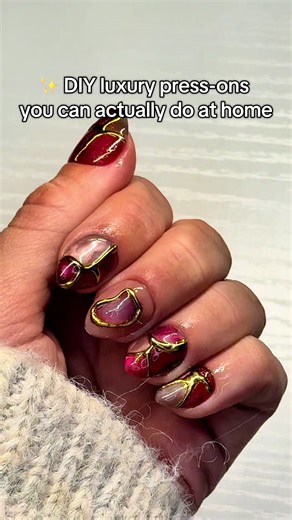 Here’s a full step-by-step tutorial on how I made these geode / mood-ring-vibe nails 💎✨ I walk you through isolated chrome, isolated cat eye, layering, blending — the whole thing. It looks complicated, but it’s actually beginner-friendly once you see it broken down. My son even jumps in to help with the chrome   topcoat, which honestly made the whole thing even cuter. If you’re into textured nails, geode vibes, or anything shiny and trippy-looking, this is such a fun set to try. #christmasnails