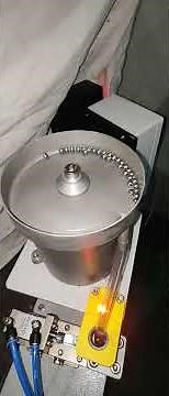 Ball feeding automation with escapement