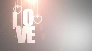 Download LOVE letters hanging on string falling from the ceiling with white backgound for free