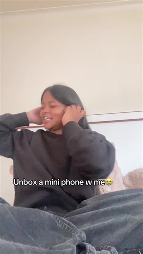 Unboxing the Mini Phone: A Fun Experience