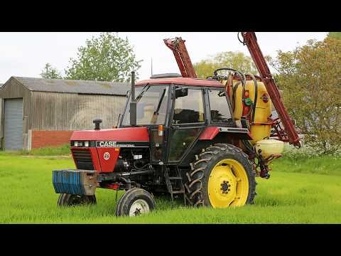 Spraying spring barley with 1985 high-clear Case IH 1394 and Hardi Master 12m sprayer