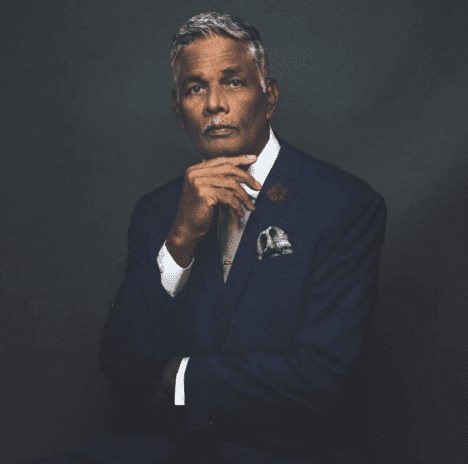 Denston Bacchus Dies at 76