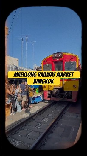 Maeklong Railway Market: Watch trains pass through this unique Bangkok market! A must-see experience