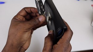 TurtleBack Leather Cell Phone Holster Pouch for iPhone 15/14/13/12/ 12 Pro Heavy Duty and Rugged, Metal Belt Clip Holder Commuter Case On Phone (Black -Sideways)