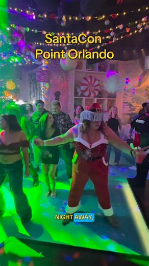 Danielle | Real Estate + Food on Instagram: "@idrivenightlife 🎅🎄 SantaCon at Pointe Orlando did not disappoint! VIP tickets gave full access to: Multiple bars and restaurants throughout Pointe Orlando, 4 complimentary drinks, access to the photo booth to capture the night with friends 📸🍹, AND 30 minutes of gameplay at Main Event. The energy was high, the holiday outfits were on point, and the vibes were unmatched. @bluemartiniorl - Shot @pbrorlando - Drink @dicks_lastresort - Drink @icebaror