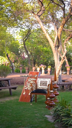 Our Al-Hamra Jaali chair, paired with the Tablet d' Moses wooden console and Thai pillars, creates a captivating look. Experience the perfect fusion of style and functionality. Want this for your own space? Call us at 923041113993 or you can WhatsApp us at 923218453611 today. #Kalamkaar #Furnitureasart #Furniture #Luxuryhomes #homeaccessories | Kalamkaar
