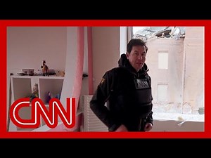CNN reporter shows grim site of family's home hit by airstrike