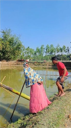 The man is walking with a cane.