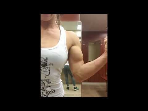 Young Fitness Girl Flexing Biceps!