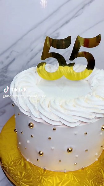 Delicious White and Gold Cake for a 55th Birthday