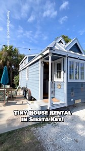 Would you stay in the "Pina Colada" tiny house rental in Siesta Key, Florida for a weekend? Inside, this tiny house features a small living space with a couch, a kitchen with apartment-size appliances, a closet, a bathroom, a main-floor bedroom, & a bonus loft bedroom—sleeps a total of 3 people! Located at Tiny House Siesta & built by Tumbleweed Tiny House Company 🏡 #tinyhouse #tinyhome #bungalow #cottage #siestakey | Dream Big Live Tiny Co.