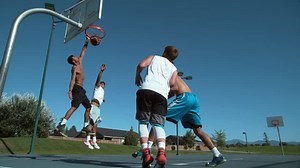 clip-19000279-super-slow-motion-shot-friends-playing-basketball