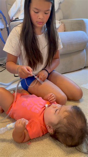 10M views · 108K reactions | Nurse in training? She’ll have all the clinical skills years in advance. Daily care is second nature around the siblings. 10yr old sister. Sammi is almost 2 1/2 years old. Sammi needs the trach & a high peep for a floppy airway. She is not on any oxygen and breathes room air just like everyone else. #trachbaby #tracheostomy #medicallycomplex #sisterlove #campomelicdysplasia | Sammi Smiles Against All Odds | Facebook