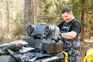 Get down & dirty with our new ATV LinQ Audio / Storage box, only from Can-Am. #canamoffroadlivin #canamoffroad #outlanderxmr #renegadexmr | Can-Am Off-Road